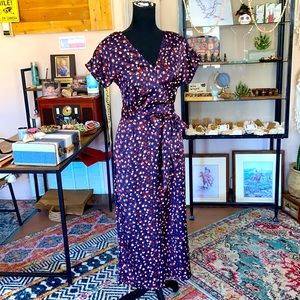 Bishop+Young Blue Leopard print Front Tie Romper with Wide Legs and open back